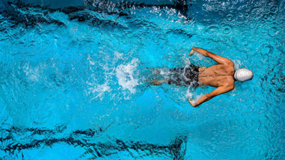 A swimmer mid-stroke