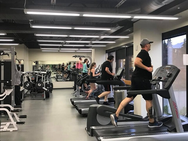 Students run on treadmills in the athletics recreation gym