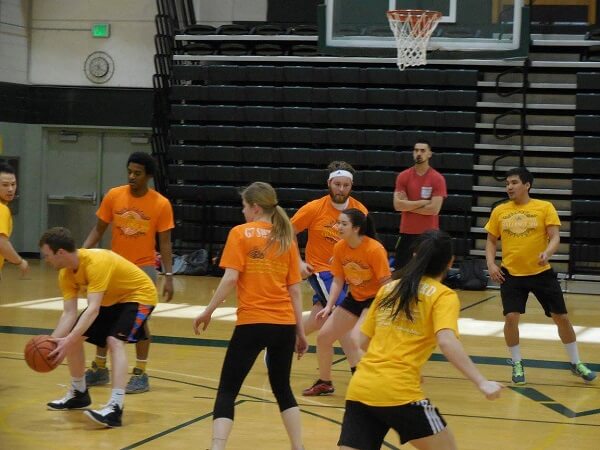 Students play intramural basketball