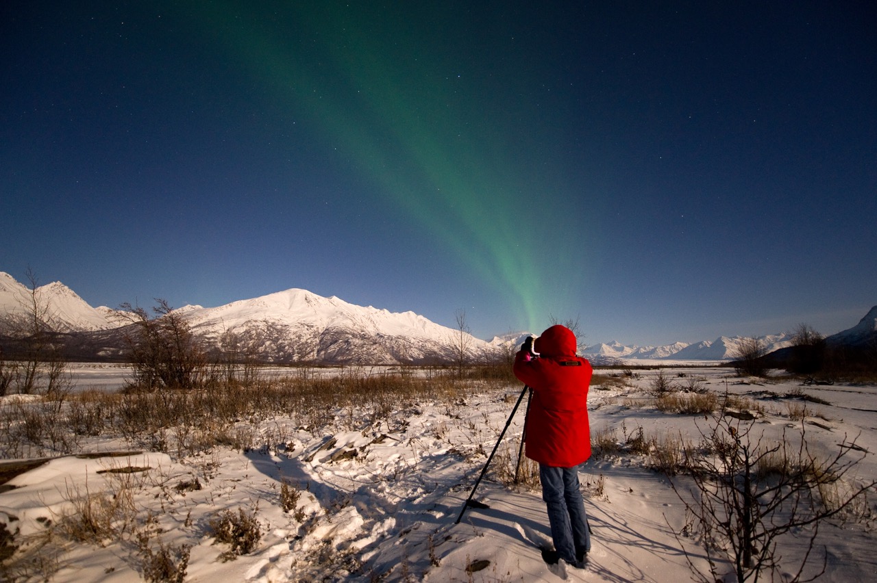 Dr. Salgado takign picture of aurora australis in Antarctica
