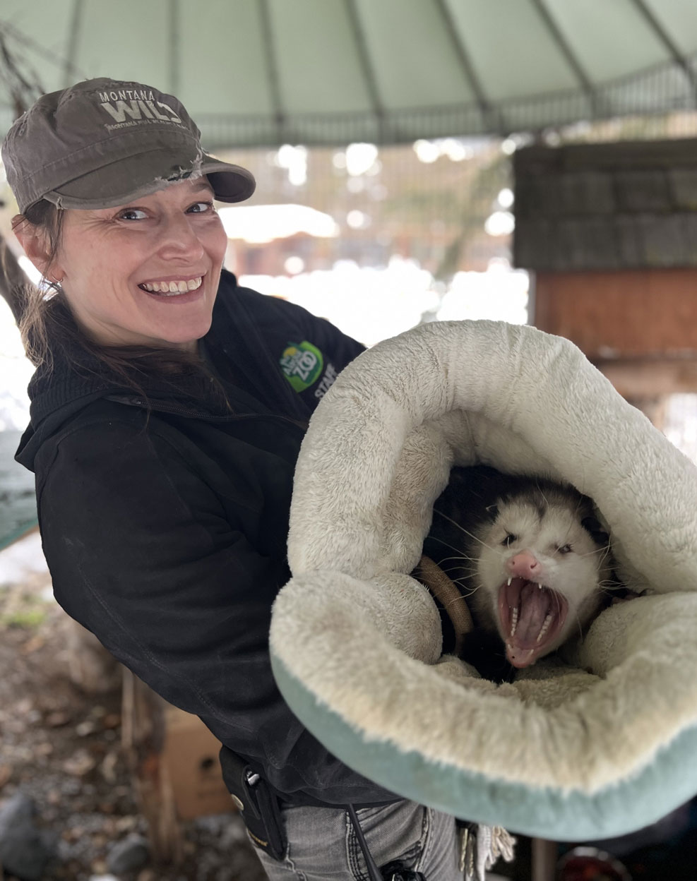 Woman holding possum