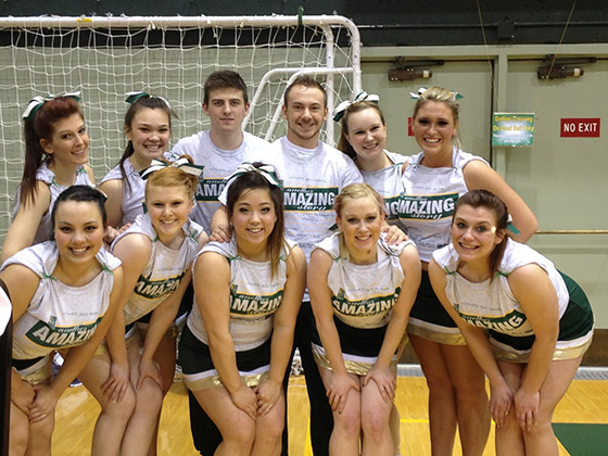 Max Bullock and UAA cheerleaders