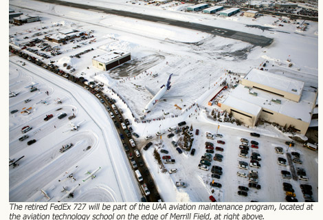 The retired FedEx Boeing 727 next to UAA's aviation technology school on Merrill Field.