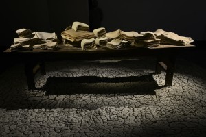  Installation view from "The Archaeology of Memory" exhibition, wooden table and clay, 2013.