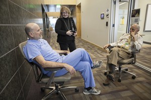 Dr. Steve Tower, Dr. Jane Shelby and Dr. Tom Nighswander talk at UAA's Health Science Building. Tower is a former WWAMI student; Shelby and Nighswander are the directors of Alaska WWAMI.