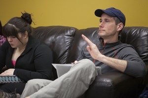 Seawolf debate team member Amy Ainslie, left, and coach Steve Johnson watch a practice debate. Photo by Philip Hall/University of Alaska Anchorage