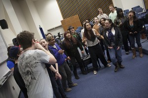 Members of the UAA Glee Club perform a song before practice, in a rehearsal room at the Fine Arts Building. Photo by Philip Hall/University of Alaska Anchorage