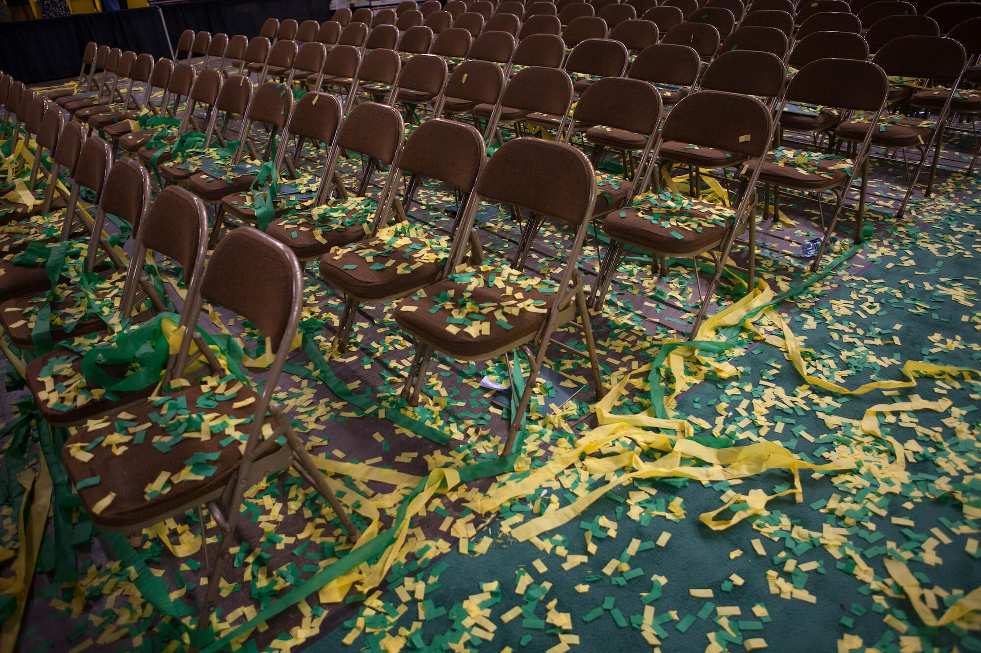 Streamers and confetti lie on the floor of the arena at the end of the 2014 University of Alaska Anchorage Commencement Ceremony at the George M. Sullivan Arena in Anchorage, Alaska Sunday, May 4, 2014.