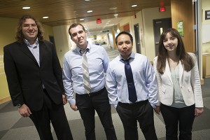 UAA Management Information Systems students David Herbert, left, and Brian Smith (not pictured) won first place for database design and Will Taff, Kaden Galvez and Colleen Zink won first prize in the web project contest for their Kicks for Kids website, at the recent AITP National Collegiate Conference in Atlanta. Photo by Philip Hall/University of Alaska Anchorage