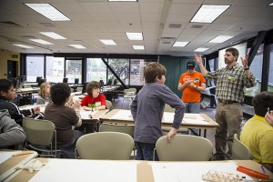 Dr. Scott Hamel directs UAA's Summer Engineering Academies. Here, he instructs kids about bridge building. Photo by Theodore Kincaid.