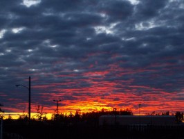 A new UAA project aims to capture the essence of Anchorage neighborhoods, via tours, stories and photos. This vista was seen on an August evening, from Mountain View. Photo by Tracy Kalytiak