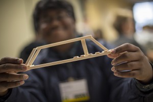 James Tatum shows his balsa bridge at "Structure Destruction" summer engineering academy at UAA. Photo by Theodore Kincaid/UAA
