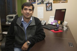 Hari Kafle, a refugee from Bhutan, arrived in Anchorage five years ago. He now works for Catholic Social Services, helping other refugees adjust to new lives in the United States. (Photo by Philip Hall)