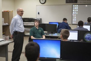 Professor Donn Ketner speaks to students in his capstone construction management class. (Photo by Philip Hall/UAA)