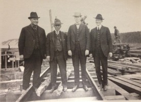 Frederick Mears stands second from right on a newly constructed Anchorage dock. Frederick Mears collection, Archives & Special Collections, UAA/APU Consortium Library.