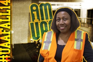 I AM UAA: Irene Hilliard, Class of 2015, is a December grad with a graduate certificate in human services. Here she's sporting her "signature" orange vest. Key to helping her afford school was parking her vehicle and taking the bus. Her reflective vest keeps her visible on her dark morning and evening walks to and from the bus stop. (Photo by Philip Hall/University of Alaska Anchorage)