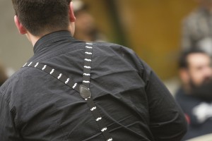 UAA senior Timothy Dommek sported a sweet set of moustache suspenders at the event (Photo by Philip Hall/University of Alaska Anchorage).