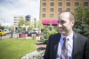Clayton Damm, A.A.S. '09, started as a student intern in the Captain Cook's bake shop, but now serves as catering director for the hotel's 12 event spaces (Photo by Ted Kincaid / University of Alaska Anchorage).