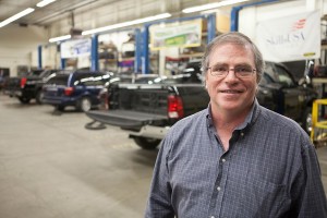 Kelly Smith, director of the UAA Transportation & Power Division, is the recipient of the Distinguished Service Award from the International Association of General Motors Automotive Service Educational Program. (Photo by Phil Hall/University of Alaska Anchorage)