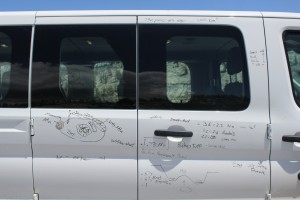 Out in the field, the big  van doubles as a big whiteboard (Photo courtesy of Jose Mora).