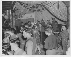 Women dance with servicemen at the Halloween 1943 dance in Anchorage's USO building. (Photo from Beulah Marrs Parisi Collection, Special Collections and Archives, UAA/APU Consortium Library)