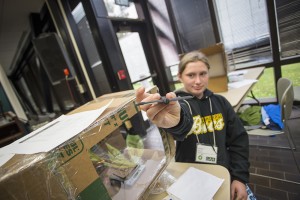 Shelby Mattingly displays a wind tunnel she made during UAA's summer engineering academy on wing aerodynamics. (Photo by Theodore Kincaid/UAA)