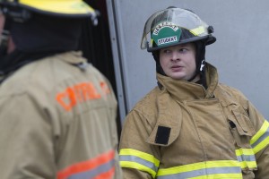 Timothy Robbins trained alongside full-time staff on a recent shift in Wasilla (Photo by Philip Hall / University of Alaska Anchorage).