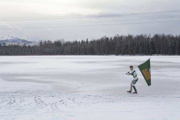 Members of the University of Alaska Anchorage Ski Team pose for photos at Goose Lake in Anchorage, Alaska Wednesday, Nov. 11, 2015.