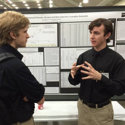 Ian's research on asteroid porosity attracted a crowd of interested Earth-focused geologists at the GSA conference in Baltimore (Photo courtesy of Ian Minnock).