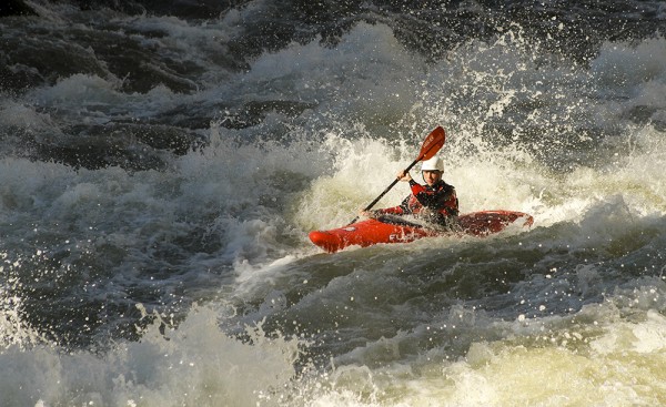 In addition to being a stellar student, Xavier Engle was a world-class kayaker before an accident claimed his life in November 2014. Here, Xavier paddles on the north fork of the Payette River in Banks, Idaho. (Photo by John Webster/webstermediahouse.com)