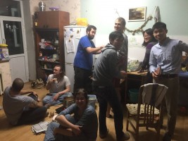 Hayley, seated in the center, and several friends from the Peace Corps and from Mongolia, meet in Sukhbatur (photo courtesy of Hayley Crow).