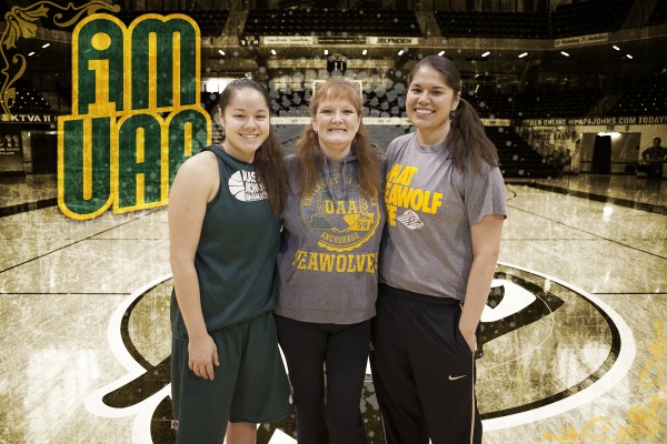 I AM UAA: Sarah Afoa, center, played for the women's basketball team in the early 1980s. Now, daughter Sierra (left) plays and Shaina (right) coaches for the #1 ranked team in the nation (Photo by Philip Hall / University of Alaska Anchorage)