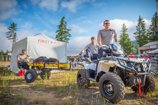 I AM UAA: Matt Sabelman, A.A.S. paramedical technology '07 (at right), is building an event medicine business in the high desert playground of Bend, Ore. (Photo courtesy of Adventure Medics).