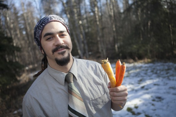 Devin Johnson poses for a photo outside of the Student Union on the University of Alaska Anchorage campus in Anchorage, Alaska Friday, Feb. 26, 2016.