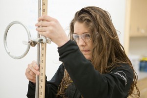 0Student works on a physics lab
