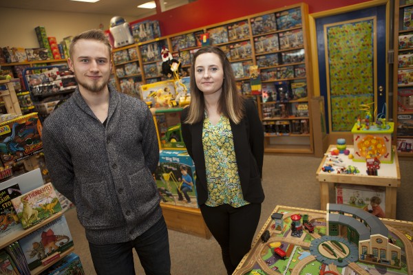 Bryan Haugstad, on the left, and Molly Conlin pose for a photo in Classic Toys in Anchorage, Alaska Tuesday, March 8, 2016.