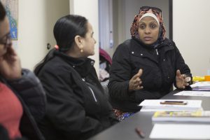 Zabeeba Mohamed, from Ethiopia, explains the Peer Language Navigator program, part of an Anchorage collaborative that helps refugees and immigrants obtain and understand health information in Anchorage (Photo by Phil Hall / University of Alaska Anchorage).