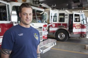 Zach Stubbs, A.A.S. Fire Science '06, is a fire captain at Station 1 in Anchorage, the largest and busiest firehouse in Alaska. Earlier this year, he was named to the Alaska Journal of Commerce's 'Forty under 40' (Photo by Phil Hall / University of Alaska Anchorage).