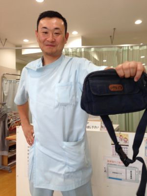 A mini-mystery solved: A pouch inside Yu's backpack belonged to Shine Murai, who now runs an osteopathic clinic in Tokyo (Photo by Etsuko Tsubonuma).