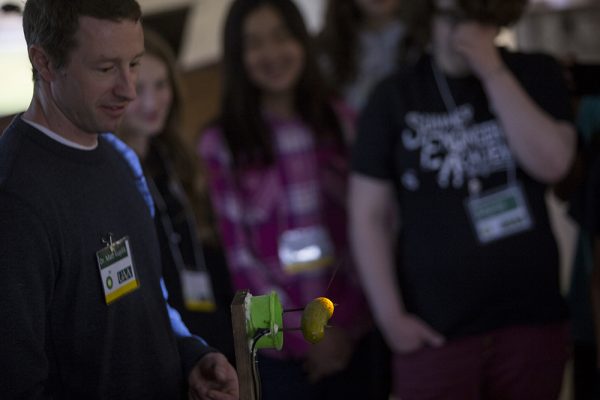 Middle school students learn the basics of mechanical engineering at UAA's BP-sponsored summer engineering academies. Here, they learn about electrical currents by placing voltage across a pickle. (Photo by Theodore Kincaid / University of Alaska Anchorage)