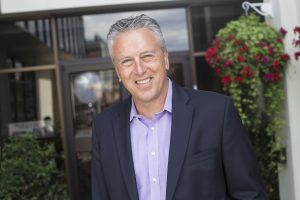 Bruce Bustamante, B.B.A. '99, is president of the Anchorage Chamber of Commerce and has built a career sharing the benefits of the city (Photo by Ted Kincaid / University of Alaska Anchorage).