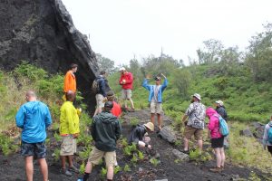 At Pu'u Hulu Hulu, Terry, in blue jacket, helped his students complete an assignment for Frank Trusdell of the Hawaii Volcano Observatory (Photo courtesy of Jed Long).