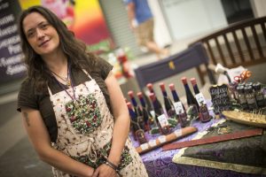 Holly has been in the balsamic business for eight years. Find Mosquito Mama at the farmer's market, or in specialty stores statewide (Photo by Ted Kincaid / University of Alaska Anchorage).