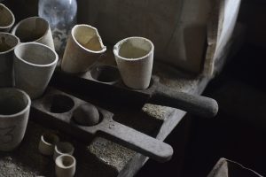 These crucibles are among the items inside the Gold Cord Mine's mill. (Photo by Tracy Kalytiak / UAA)