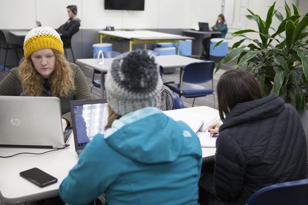 Micaela Petersen, Sarah Anderson, and Karmen Gomez study in the Learning Commons, located at UAA's Sally Monserud Hall. (Photo by Philip Hall / University of Alaska Anchorage)