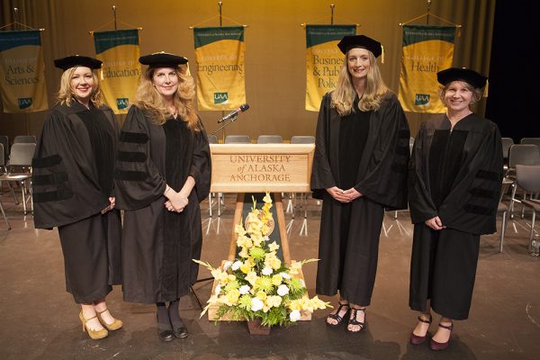 UAA's first Doctor of Nursing Practice (DNP) graduates are Jyll Green, Robin Bassett, Leigh Keefer and Jill Rife. The DNP is the highest degree offered in the nursing profession. Green, Bassett, Keefer and Rife are all family nurse practitioners who had previously earned master's degrees from UAA. (Photo by Philip Hall / University of Alaska Anchorage)