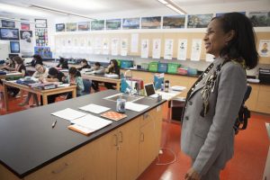 Cessilye Williams visits a classroom at Clark, where she has served as principal since 2003. (Photo by Phil Hall / University of Alaska Anchorage)