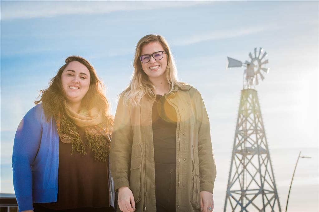 Journalism student Victoria Petersen, left, created the hyper-local news source 'The Spenardian' as part of her senior capstone. Now, Samantha Davenport, right, plans to get it in print. (Photo by James Evans / University of Alaska Anchorage)