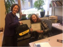 Kimberly Frost accepts the February 2018 Staff Recognition Award