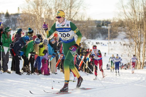 UAA student and Nordic ski team member Hailey Swirbul skis uphill during a race